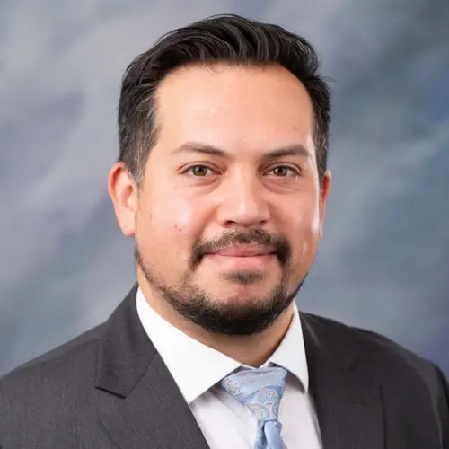 Dr. Kristian Flores